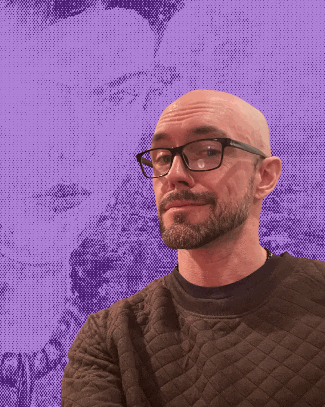 Aaron Diehl in front of a purple Frida Kahlo painting